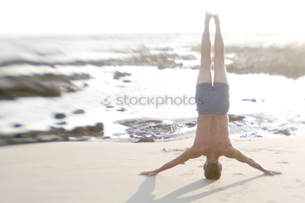 Similar – Caucasian blonde woman practicing yoga in the beach