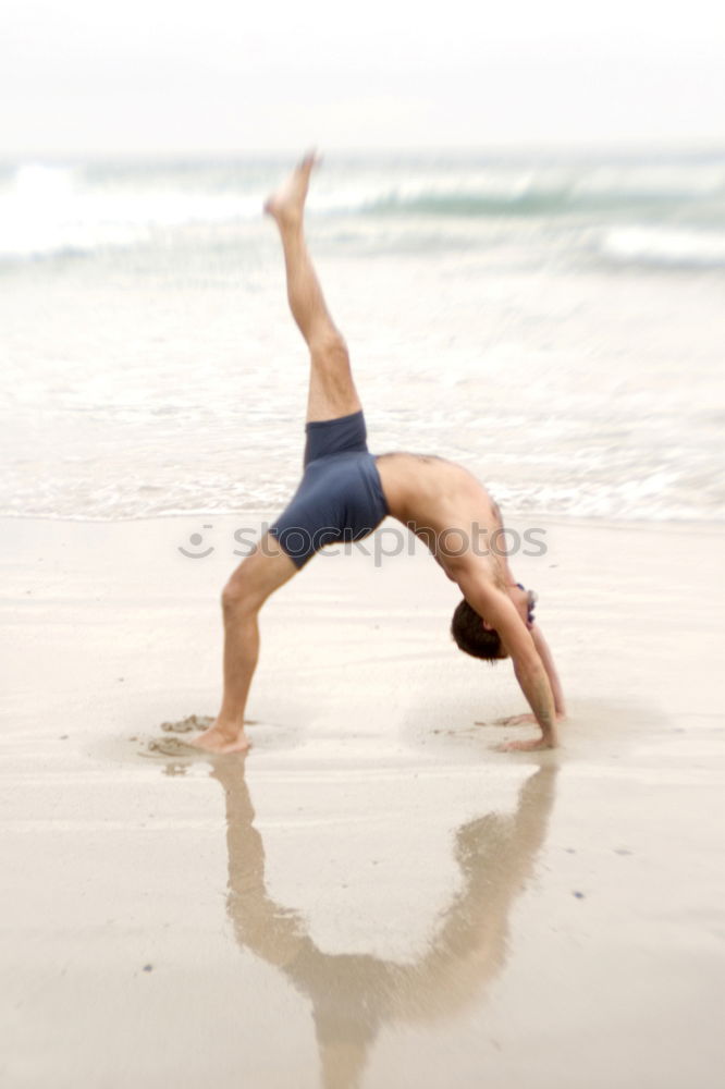 Similar – Image, Stock Photo Young women doing yoga pose on beach in the morning