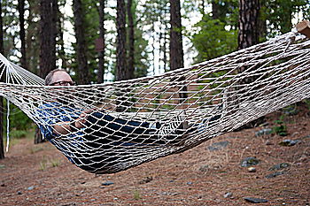 Similar – Young woman relaxing in the hammock in nature