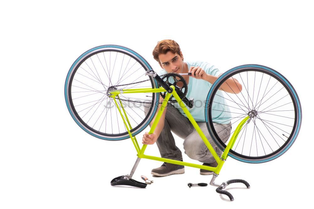 Similar – Image, Stock Photo Trendy adult man with retro high wheel bicycle on street against aged shabby building in township