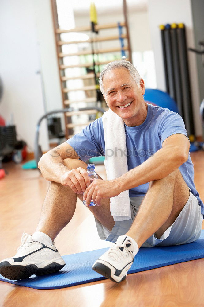 Similar – Image, Stock Photo Man stretching and woman doing dumbbells exercises in gym