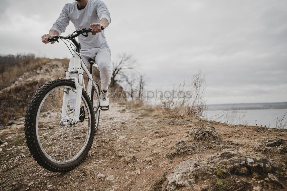 Cyclist Riding a bike at sunset. Sports