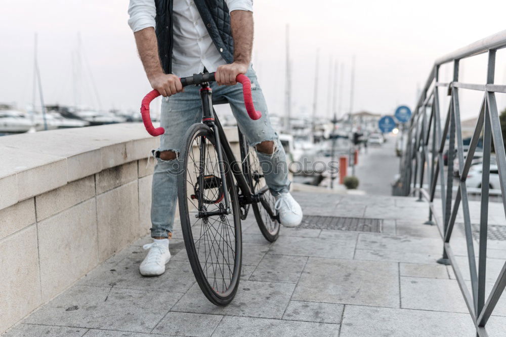 Similar – Image, Stock Photo Smiling man with sunglasses sitting at bicycle