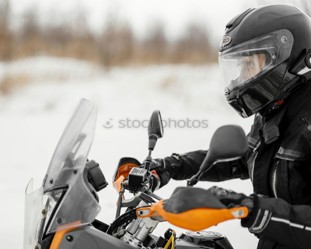 Similar – Image, Stock Photo Man riding motorcycle on snowy road