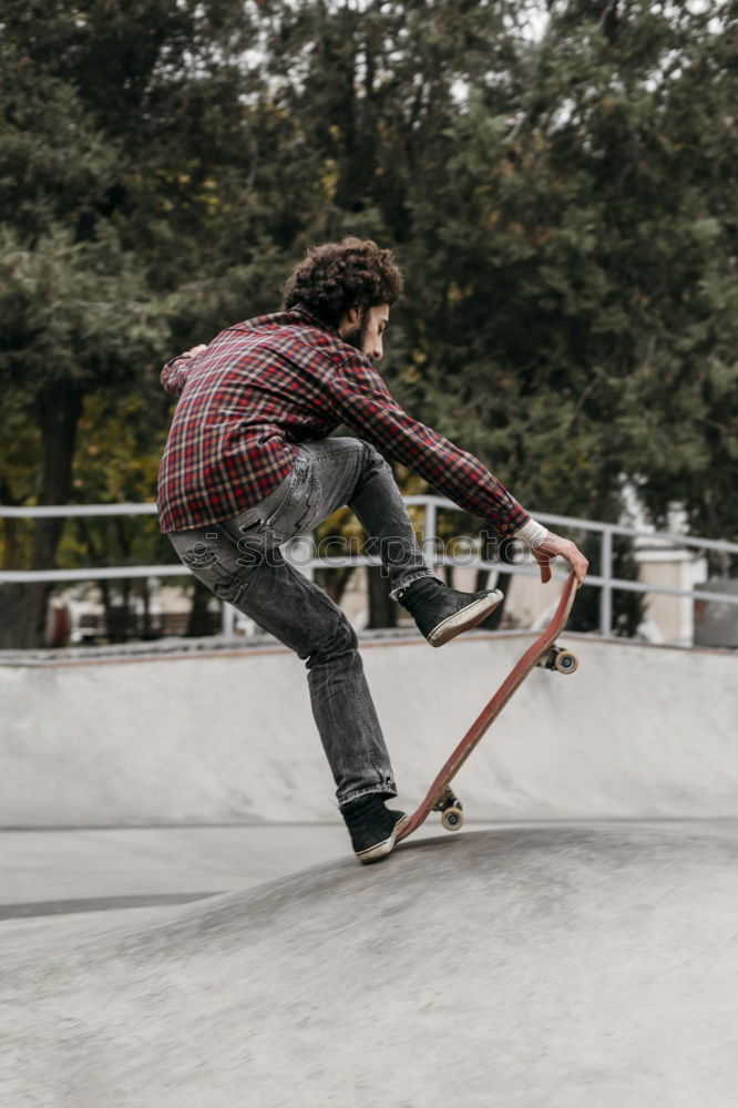 Similar – Image, Stock Photo Skateboarding woman practicing at skatepark