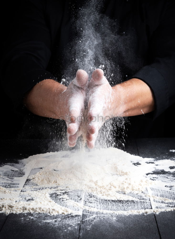 Similar – Image, Stock Photo male hands substitute white wheat flour dough