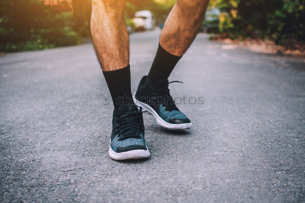 Similar – Image, Stock Photo Close up of legs of runner in the city.