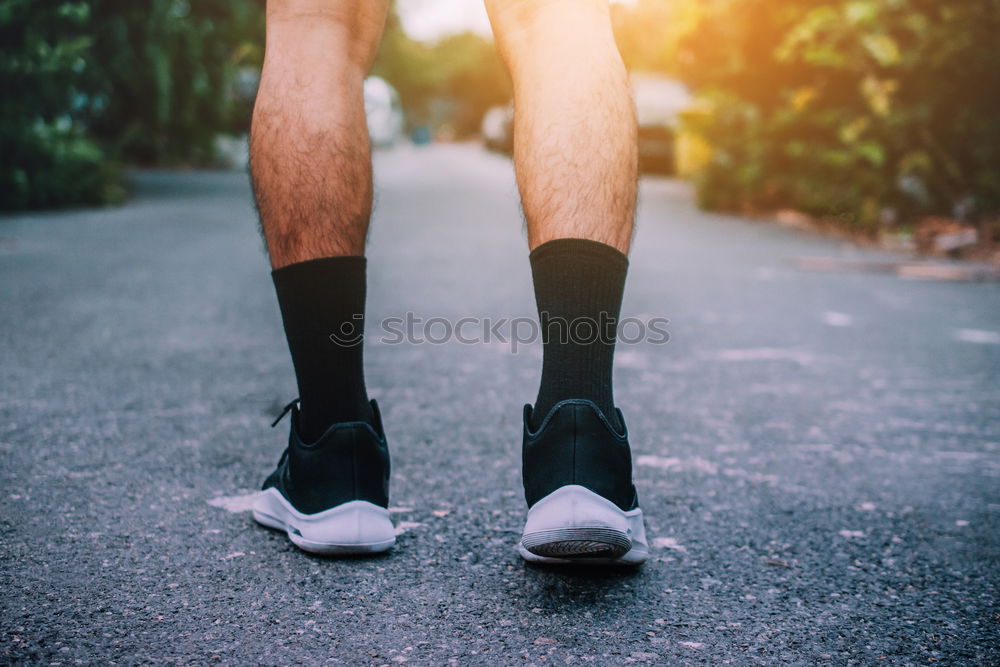 Similar – Image, Stock Photo Close up of legs of runner in the city.