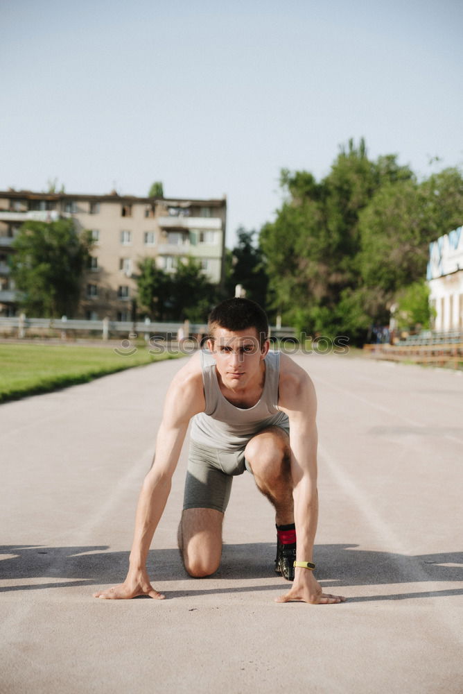 Similar – Young sports man is running up the stairs for his workout