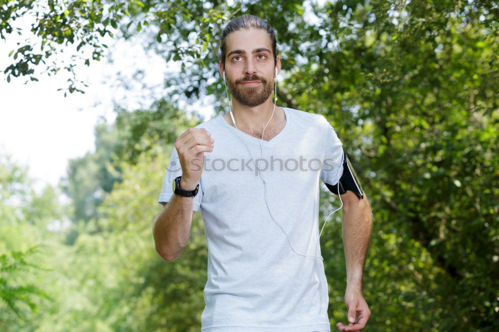 Similar – Male trail athlete posing with race number