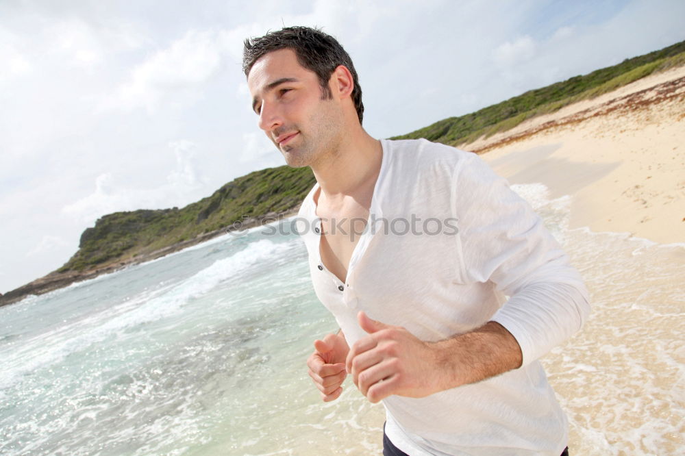 Similar – Man with skateboard at beach