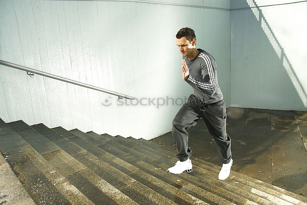 Similar – Muscular man stretching outdoors