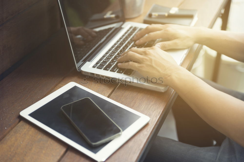 Similar – Image, Stock Photo Close-up shot ofwoman working with tablet computer on sunset and sea background