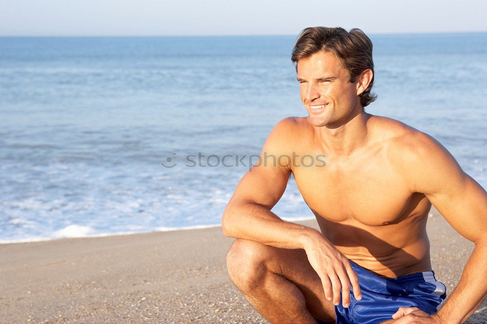 Similar – handsome swimmer putting on goggles