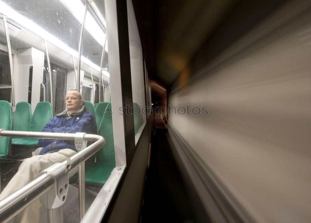 Similar – Image, Stock Photo sitting in a subway to central amsterdam