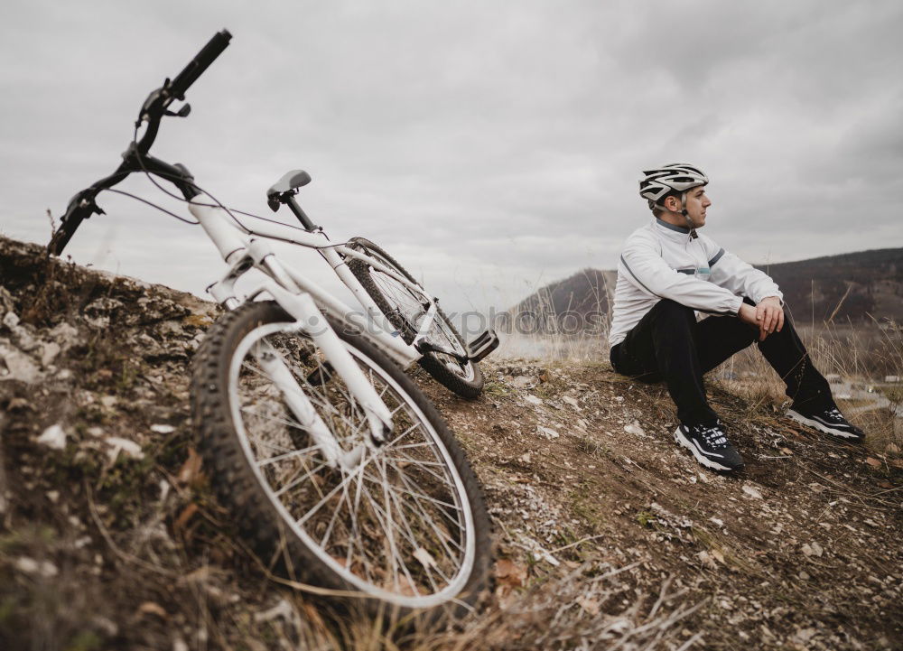 Similar – Image, Stock Photo Man walking with mountain biking