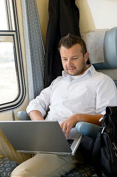 Man listening music in train