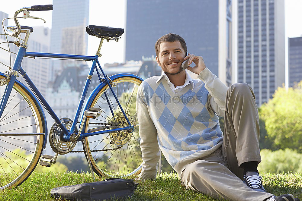 Similar – Image, Stock Photo Young man with mobile phone and fixed gear bicycle