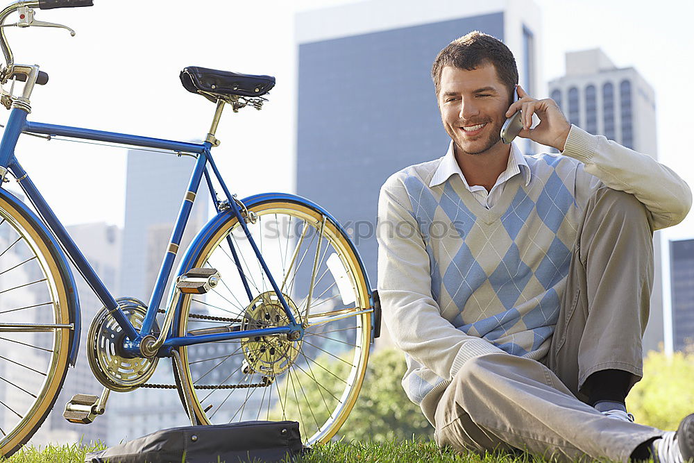 Similar – Image, Stock Photo Young man with mobile phone and fixed gear bicycle