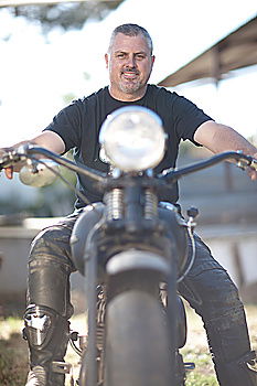 Similar – Image, Stock Photo Biker taking motorbike to the garage