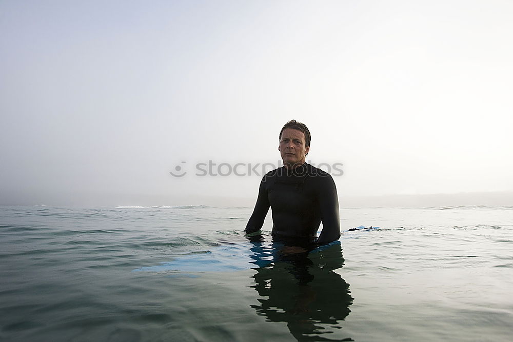 Similar – Diver posing in water Man