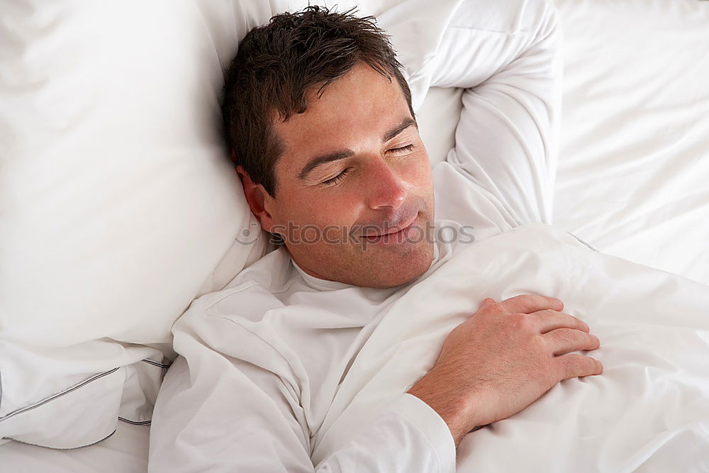 Similar – Portrait of a beautiful adult woman lying on a bed