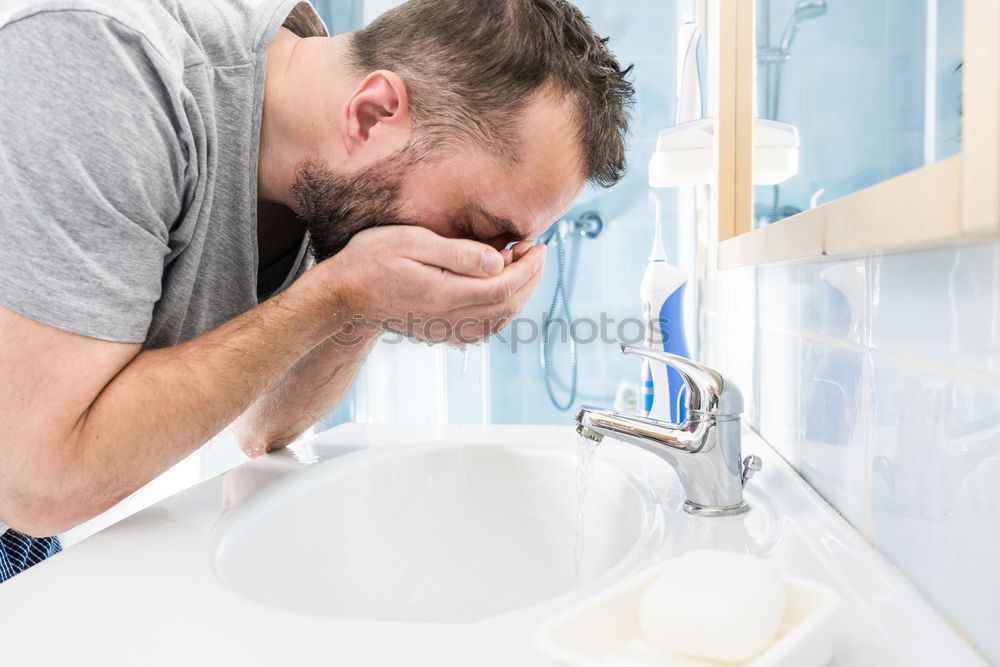 Image, Stock Photo Man rinsing his toothbrush under running water