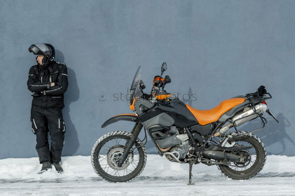 Similar – Image, Stock Photo Man riding motorcycle on snowy road