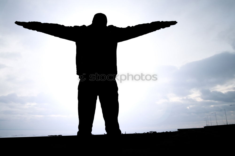 Similar – Anonymous man enjoying storm on pier