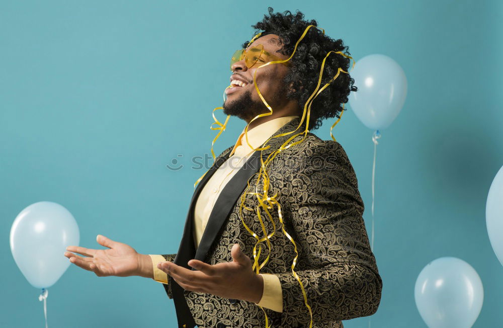 Similar – Woman with afro hair climbing by children’s attractions.