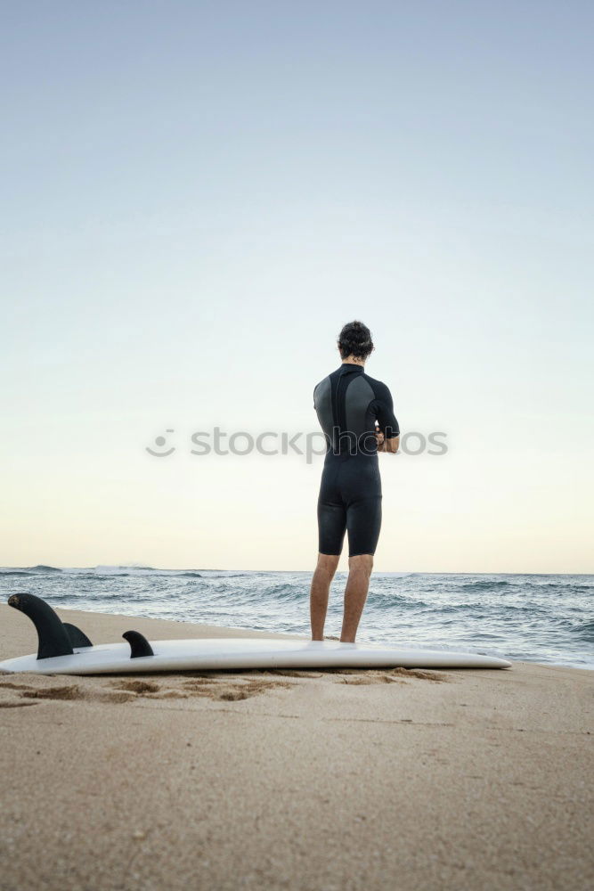 Similar – Image, Stock Photo Man in wetsuit swimming in ocean