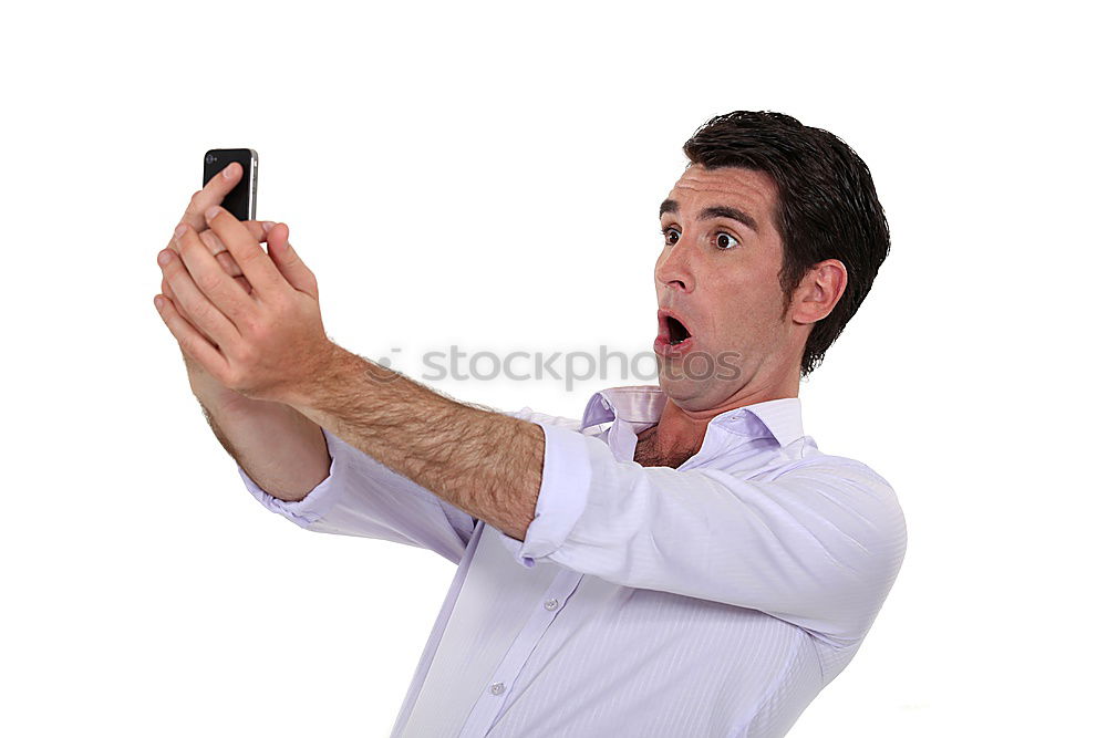 Business man with mobile phone in his hand