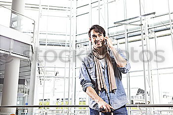 Similar – Image, Stock Photo man front walking at the airport using mobile phone