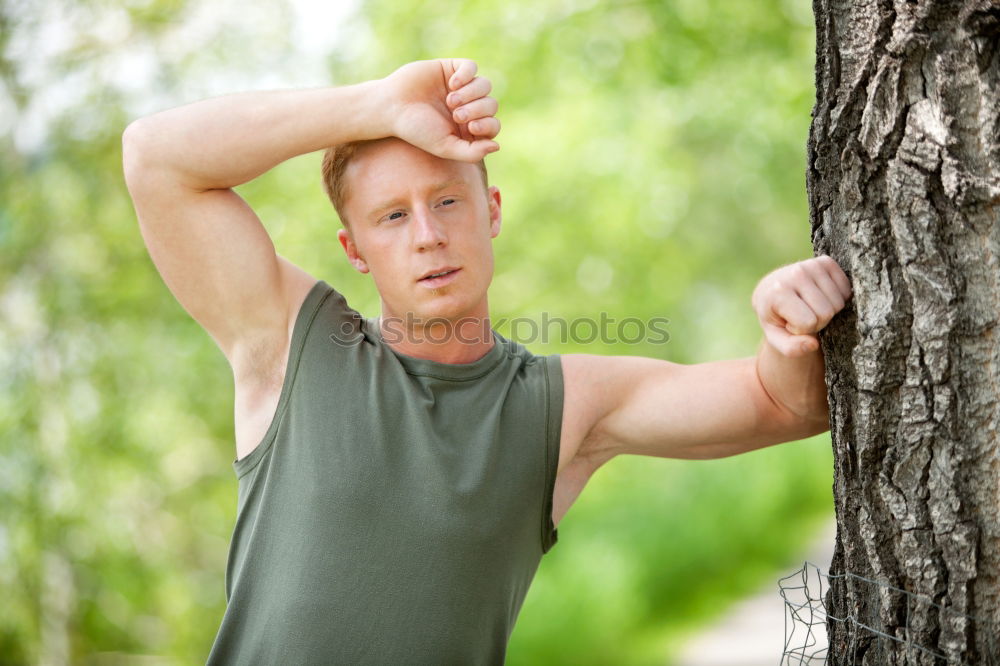 Similar – Fit shirtless young black man doing stretching