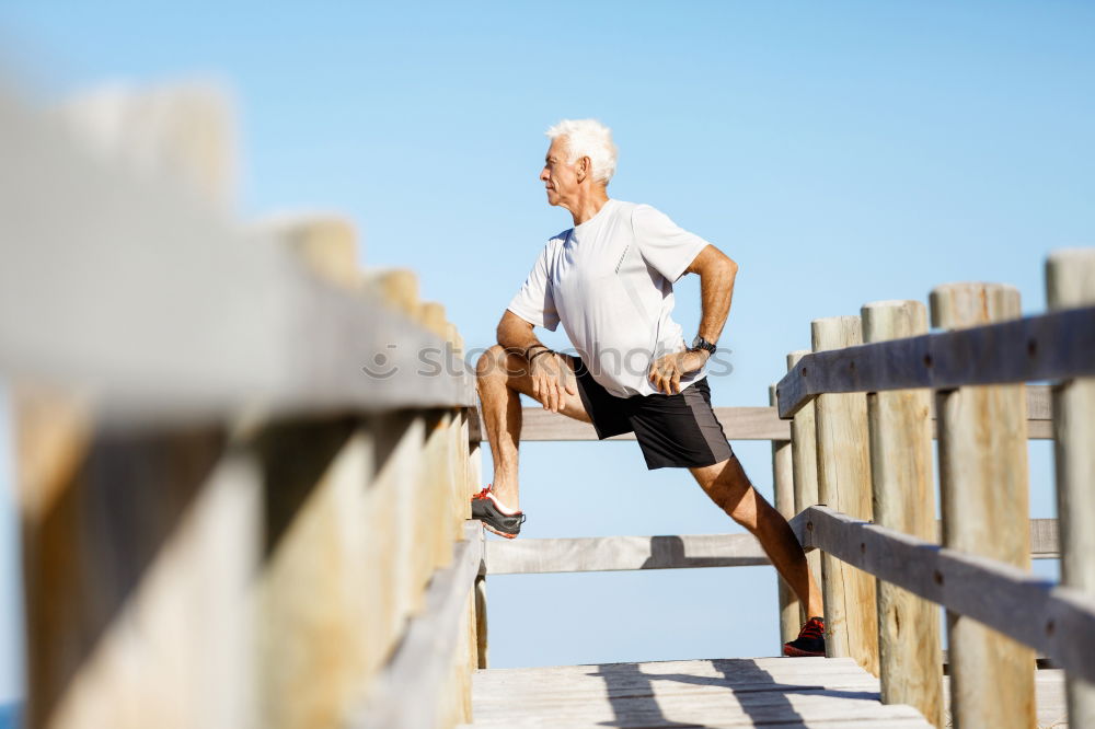 Similar – Senior runner man sitting after jogging in a park