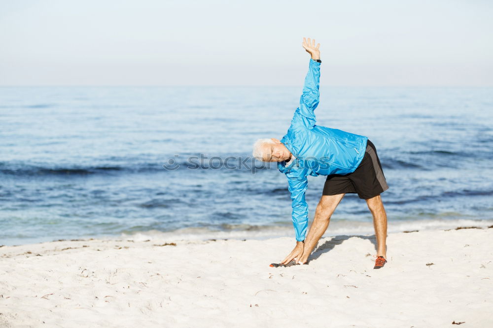 Similar – Caucasian blonde woman practicing yoga in the beach