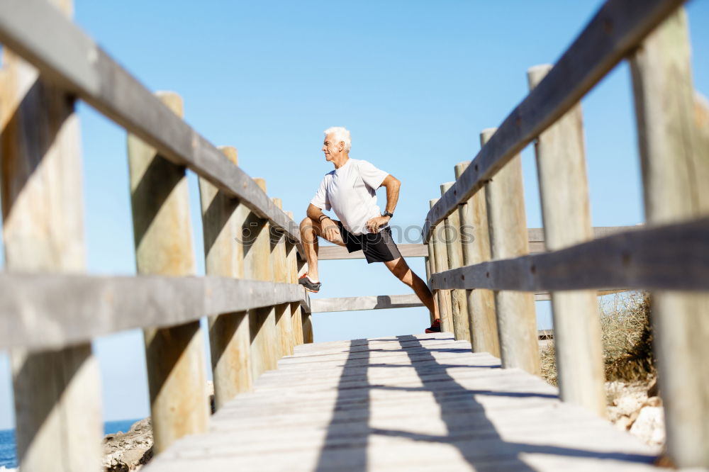 Similar – Image, Stock Photo Portrait senior man walking with his bicycle next to the sea