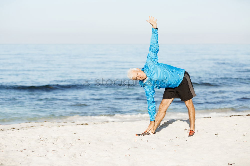 Similar – Caucasian blonde woman practicing yoga in the beach