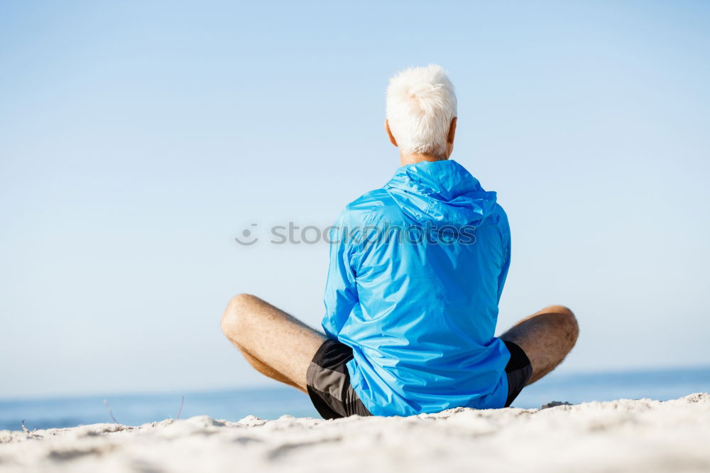 Similar – Image, Stock Photo swimmer putting on his wetsuit on the beach