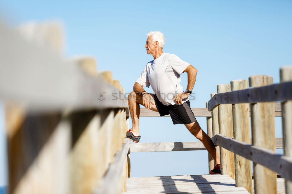 Similar – Senior runner man sitting after jogging in a park