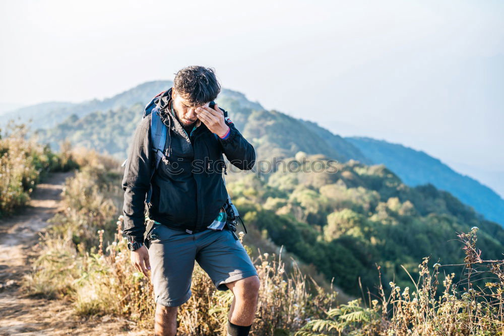 Similar – Image, Stock Photo Boy sitting on the rock in the mountains