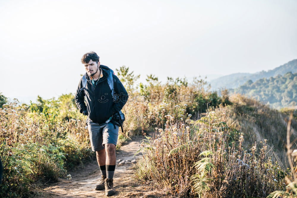 Similar – Young Backpacker enjoying of Nature.