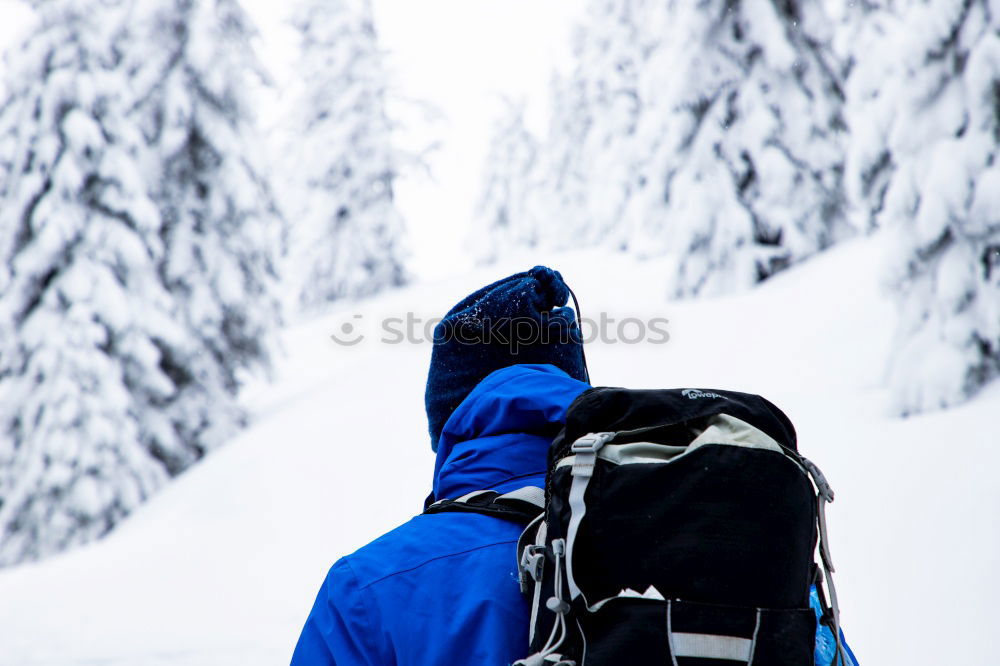 Similar – People climbing hill in snow