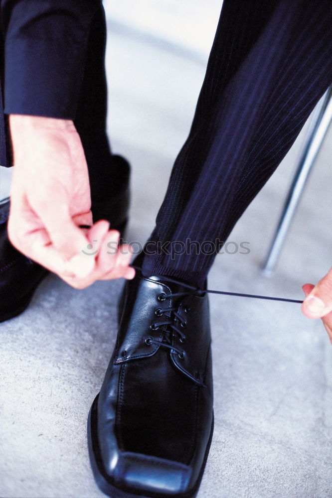 Similar – Image, Stock Photo Man wearing elegant boots