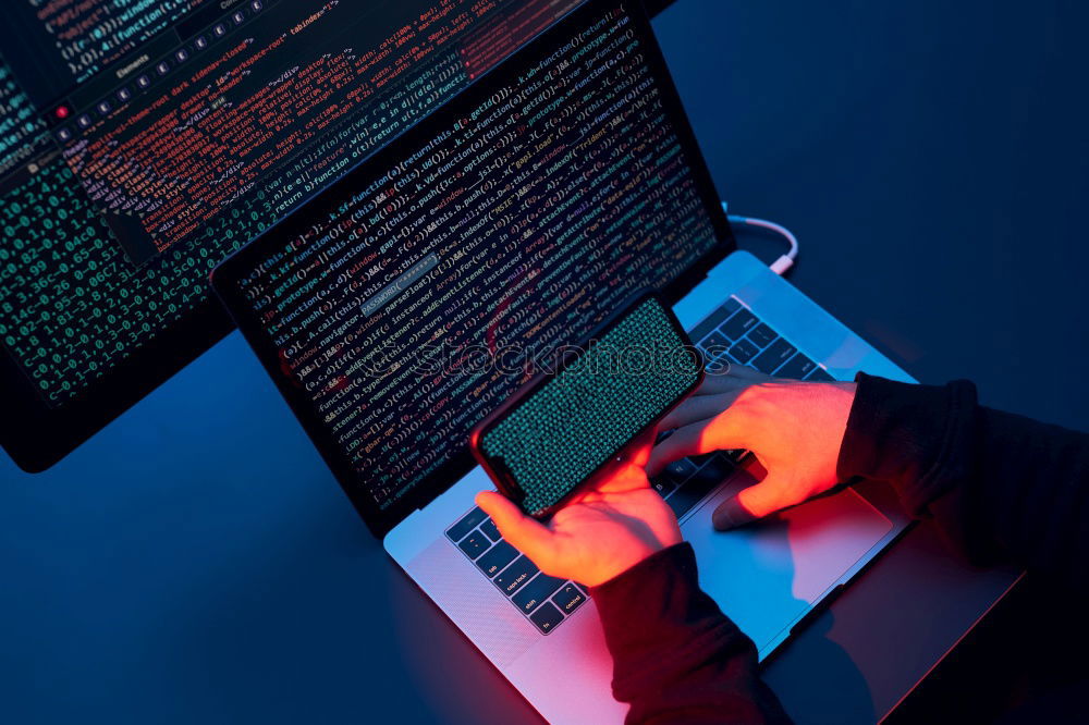 Similar – Man using computer and programming  to break code. Cyber security threat. Internet and network security. Stealing private information. Person using technology to steal password and private data