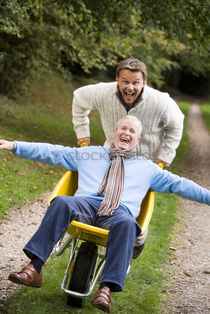 Similar – Image, Stock Photo Senior man and bored child reading newspaper outdoors