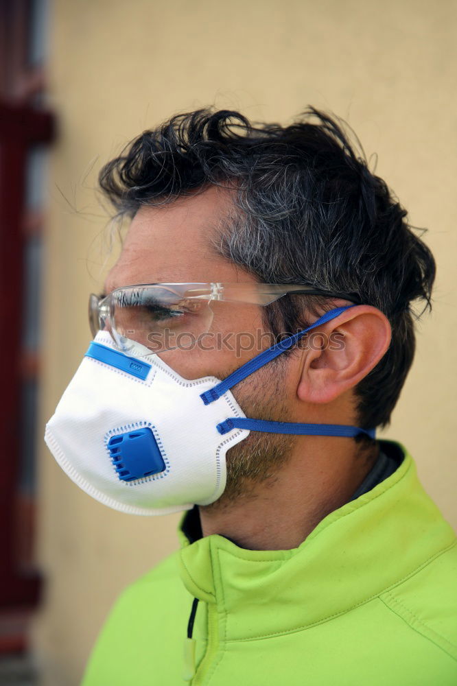 Similar – Male technician putting on goggles