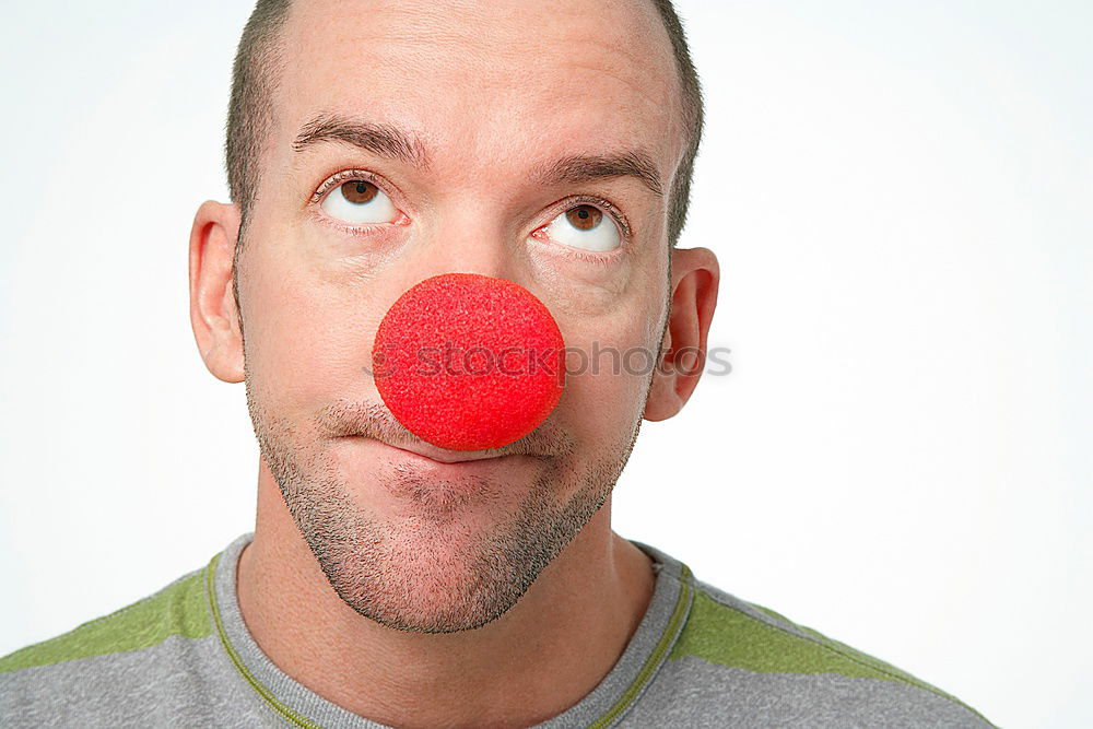 Similar – Close up portrait of a woman with red clown nose