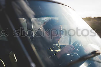 Similar – Image, Stock Photo taxi driver in the car waiting for the client