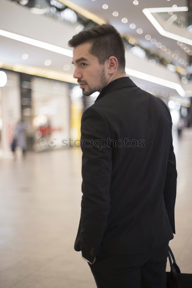 Similar – Image, Stock Photo Young business man sitting at the airport waiting for the flight